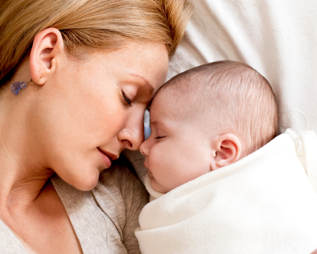 Mutter mit Kind auf dem arm